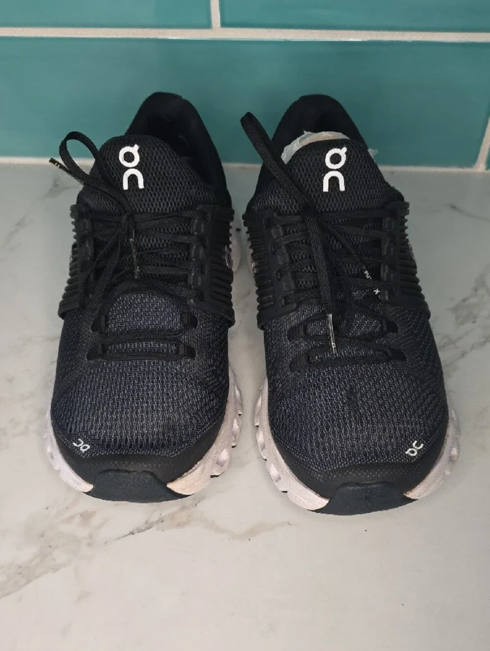 On Running Women's Black and White Cloudfoam Athletic Shoes
